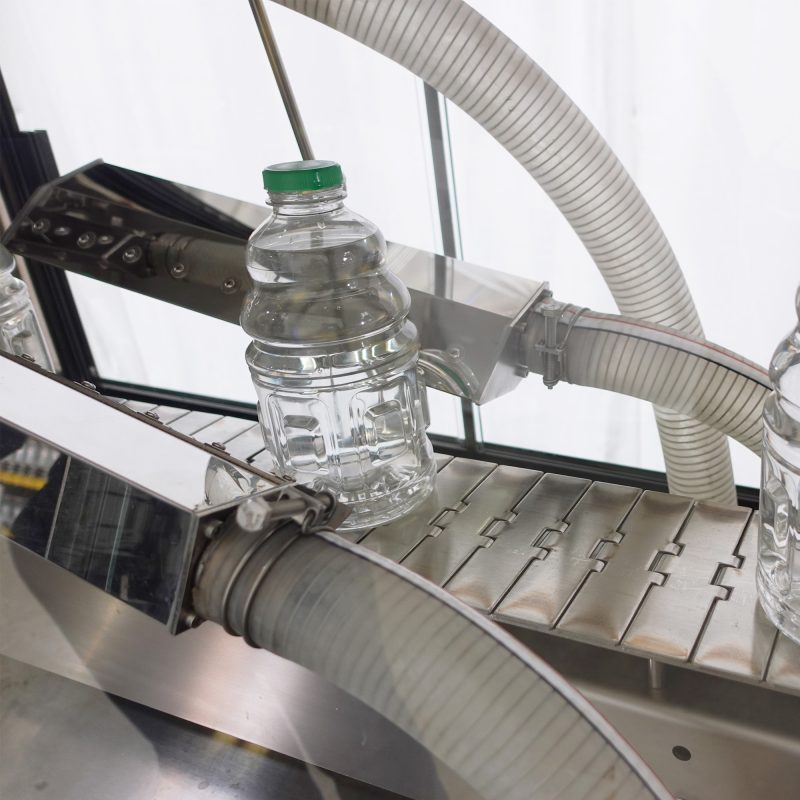Bottle Blower with Bottle on Conveyor