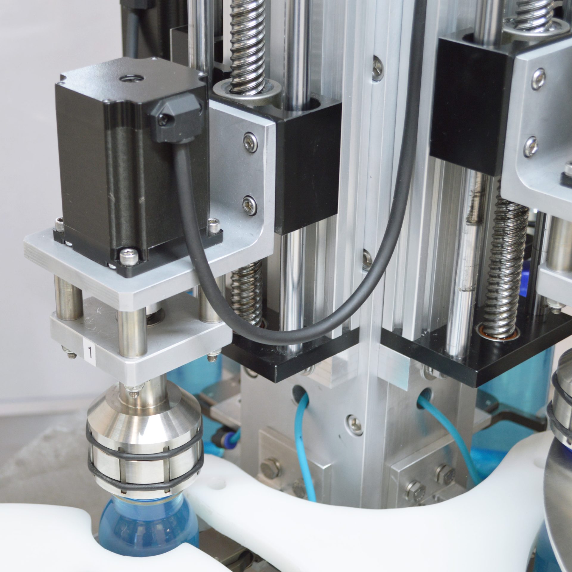 Servo Rotary Chuck Capper | Rotary Chuck Capping Systems